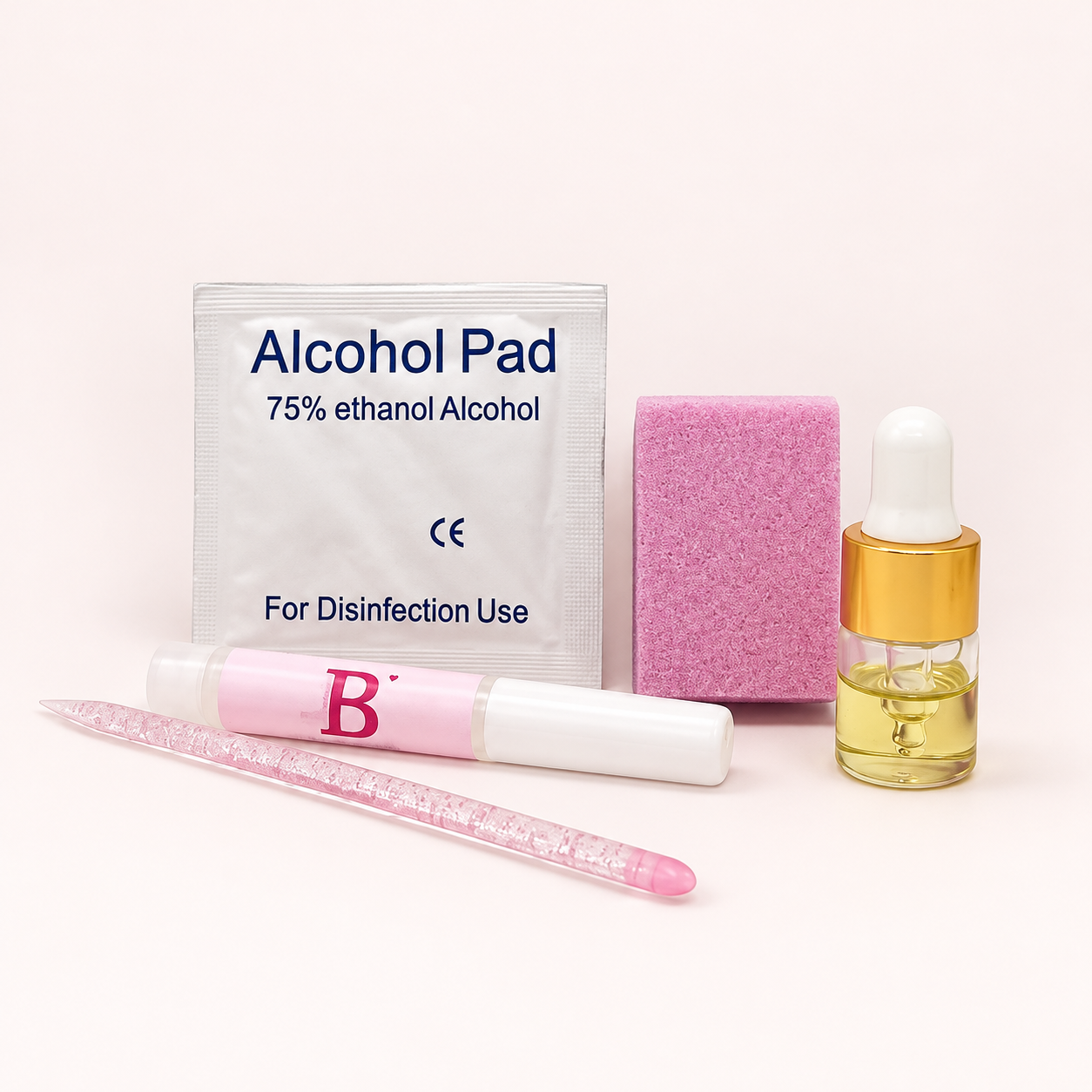Deluxe care package pictured with an alcohol pad, buffer, tools, and care oil