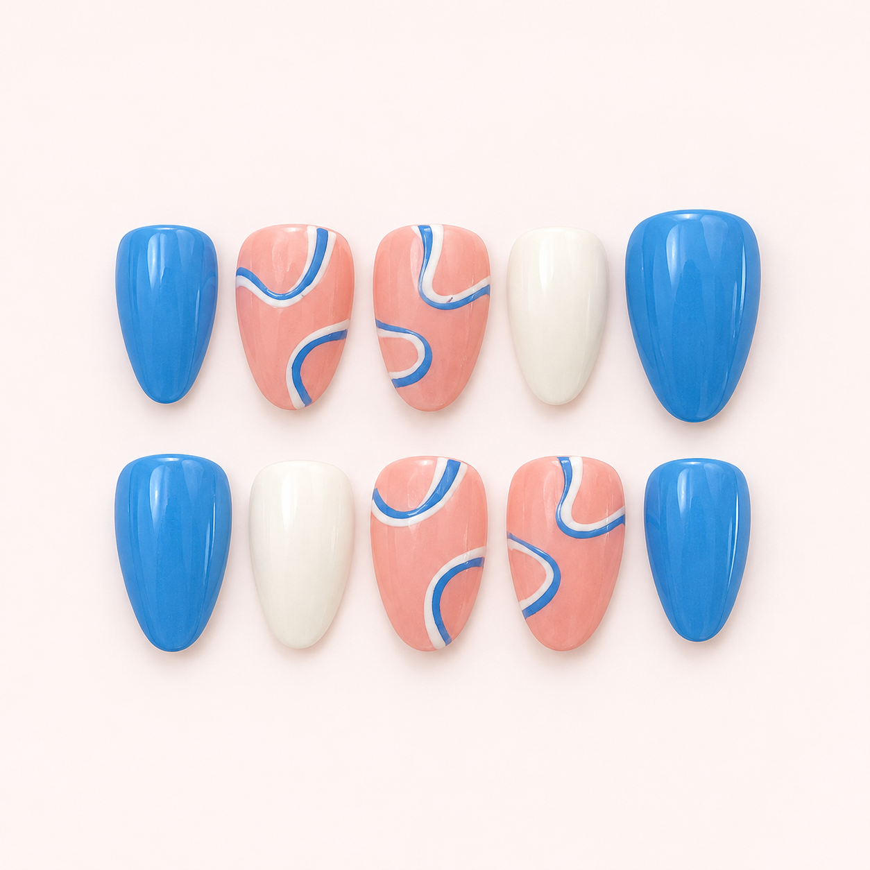 Pink, blue, and white nails with abstract curved line art